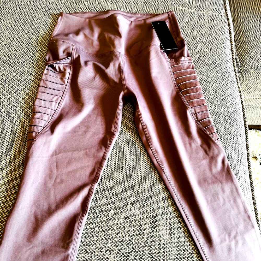 Two Large crop Leggins . One NWT the other NWOT.